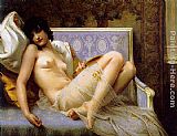 Young woman naked on a settee